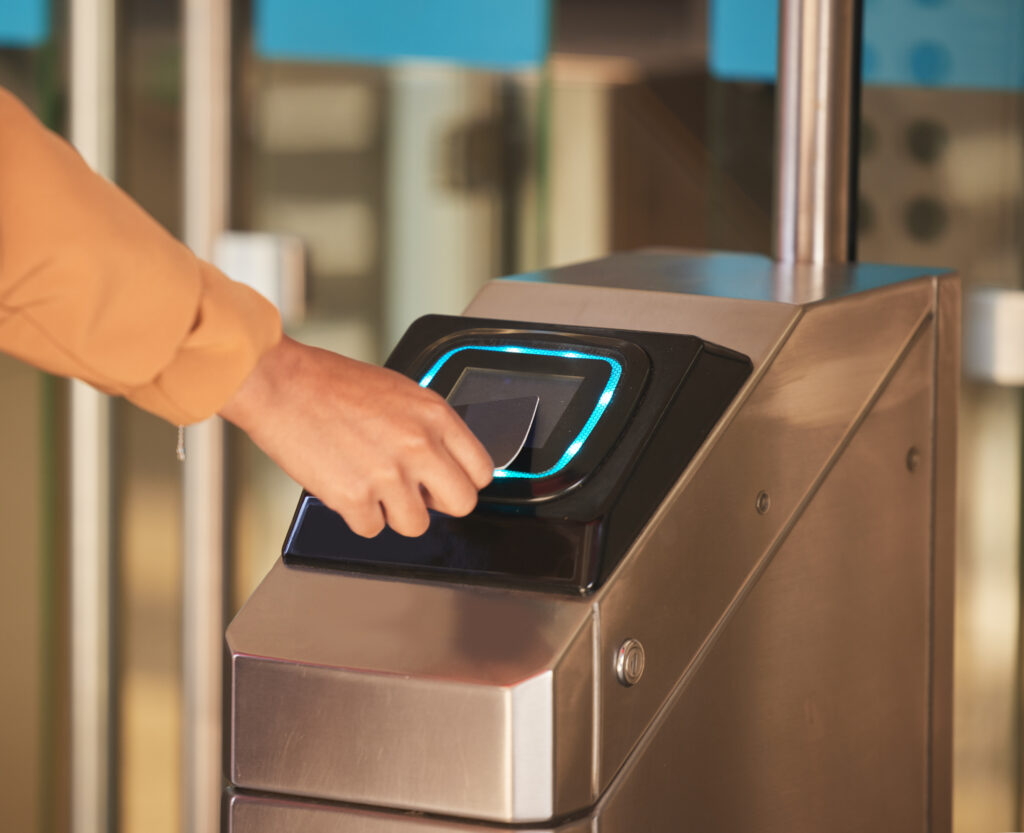 Advanced security entrance showing integrated mobile and biometric-ready access control for modern commercial offices and business sites.