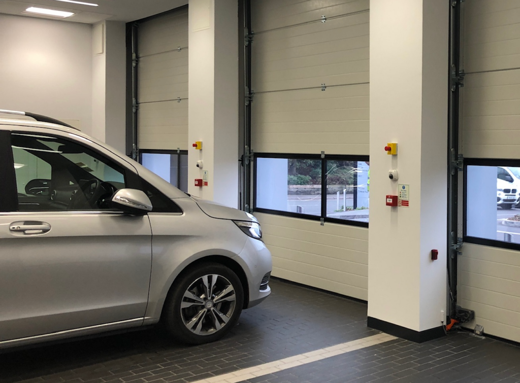 High-definition ANPR camera installed at a commercial garage entrance to record vehicle plates and enhance site security.