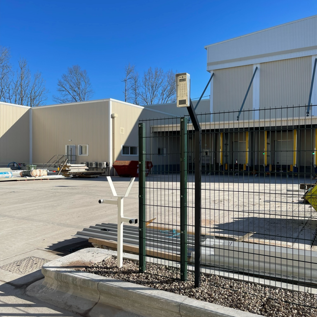 Professional installation of a high-definition video intercom system for an industrial park in Coventry, integrated with gate access control.