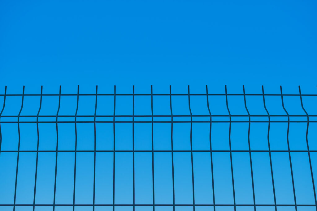 Professional full-height standalone electric security fencing installed for a commercial property in Coventry.