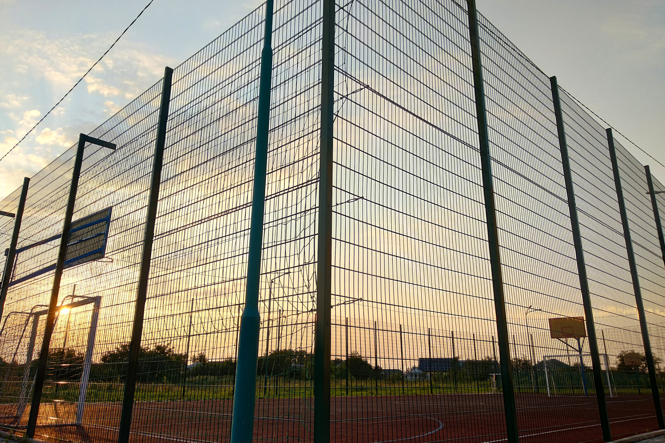 Secure ball containment fencing designed to protect surrounding areas at a Coventry multi-use games area.