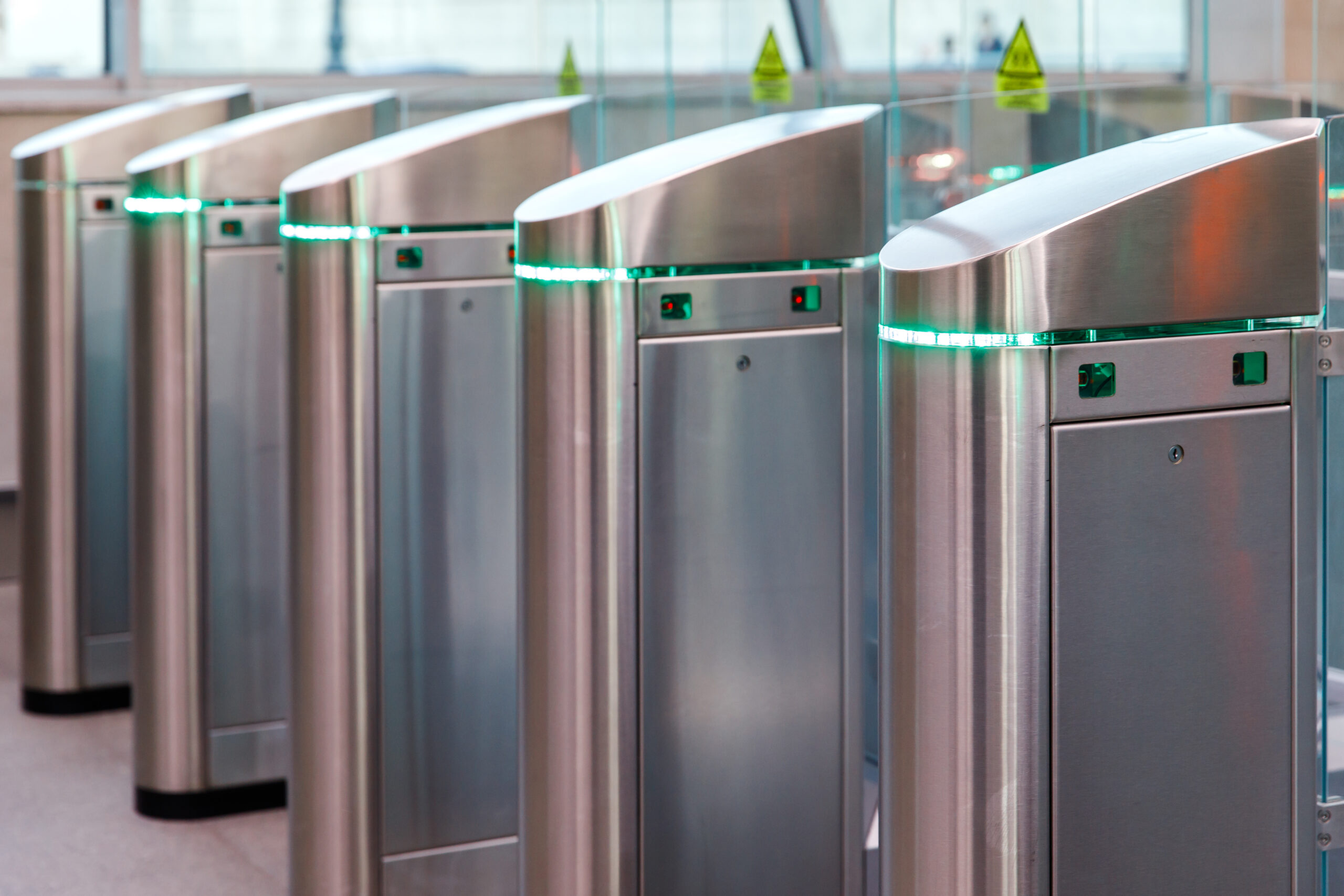 Professional installation of security speed gates in a Coventry commercial building lobby, providing secure and efficient pedestrian access control.