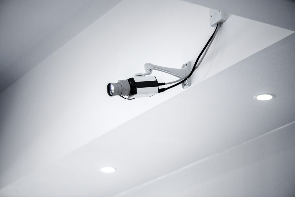 High-performance thermal imaging CCTV camera installed on a commercial building for advanced heat signature detection and perimeter security.