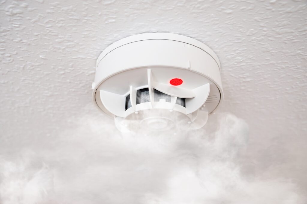 An intelligent smoke detector integrated with a smart fire verification system for 24/7 remote monitoring and false alarm reduction.